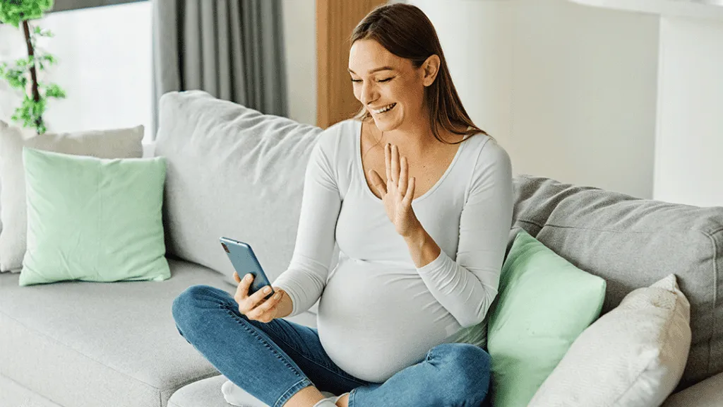 A pregnant woman calls her family back home